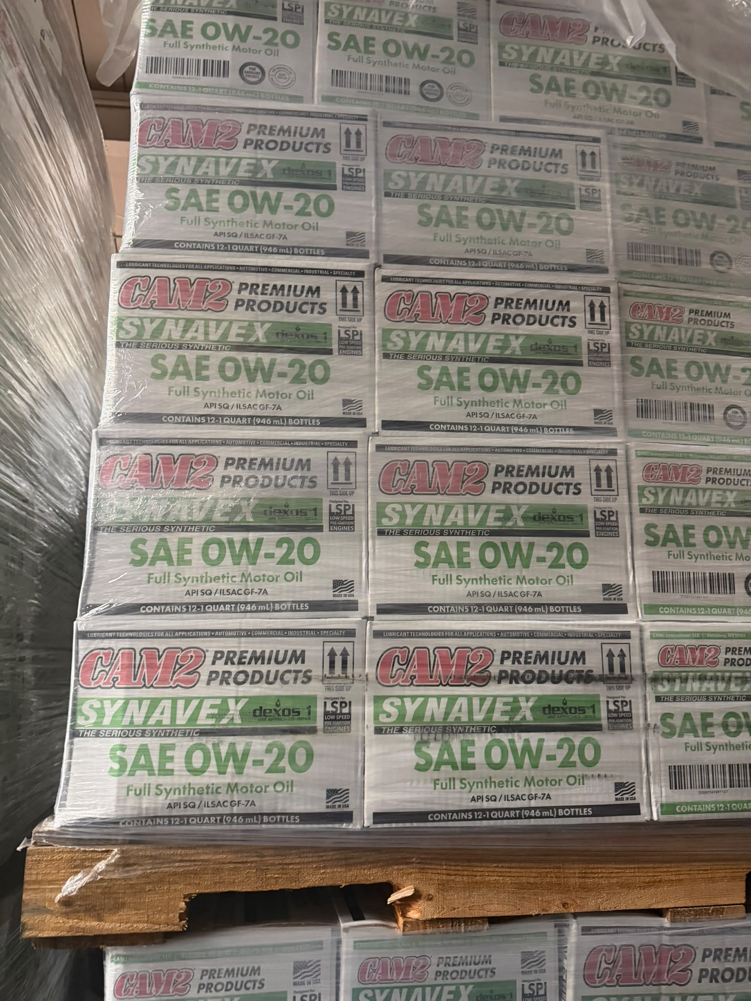 CAM2 Synavex dexos1 SAE 0W-20 Full Synthetic Motor Oil cases at the Bass Oil warehouse in Brooklyn