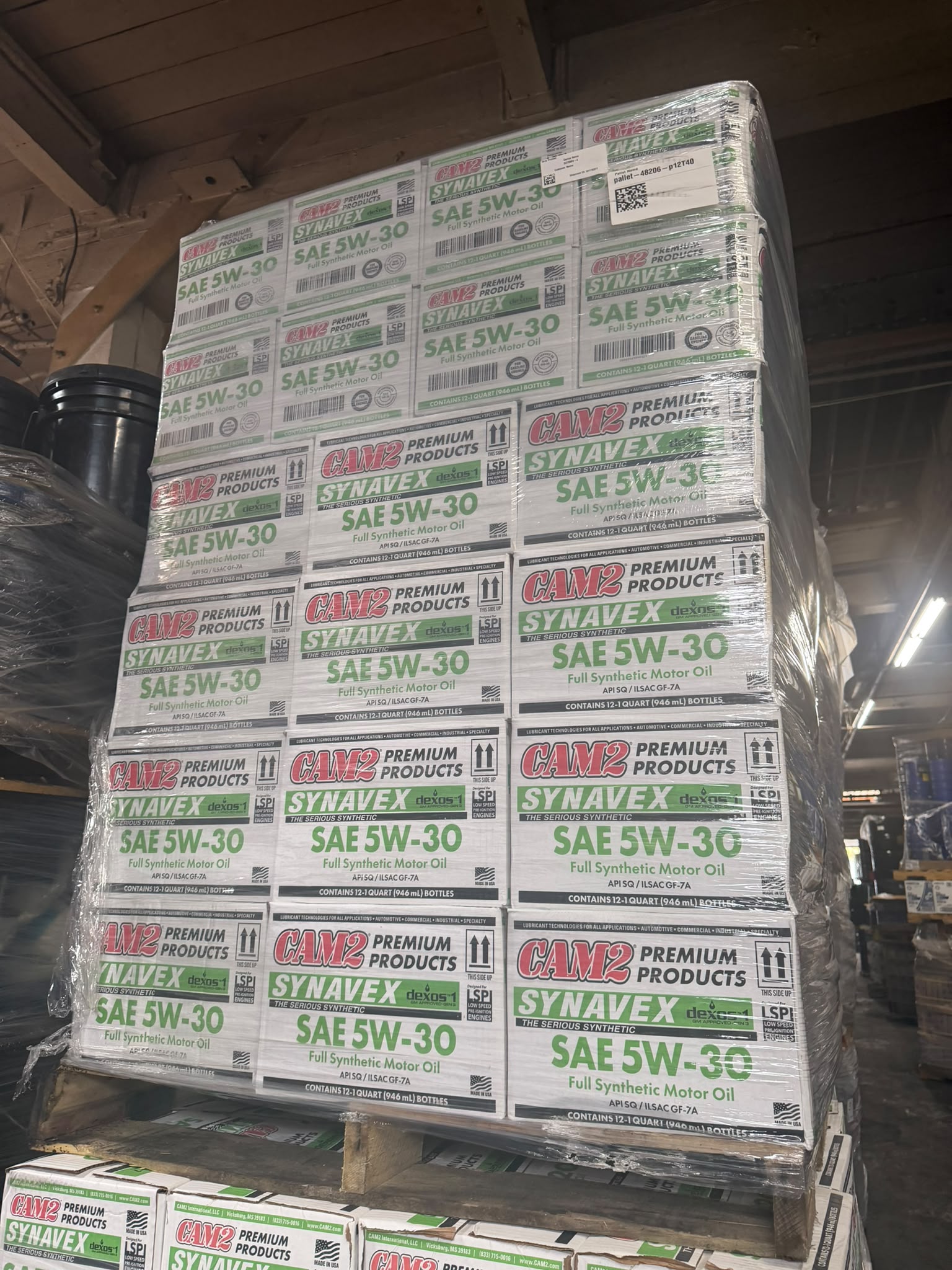 Full pallet of CAM2 Synavex dexos1 SAE 5W-30 Full Synthetic Motor Oil cases at the Bass Oil warehouse in Brooklyn