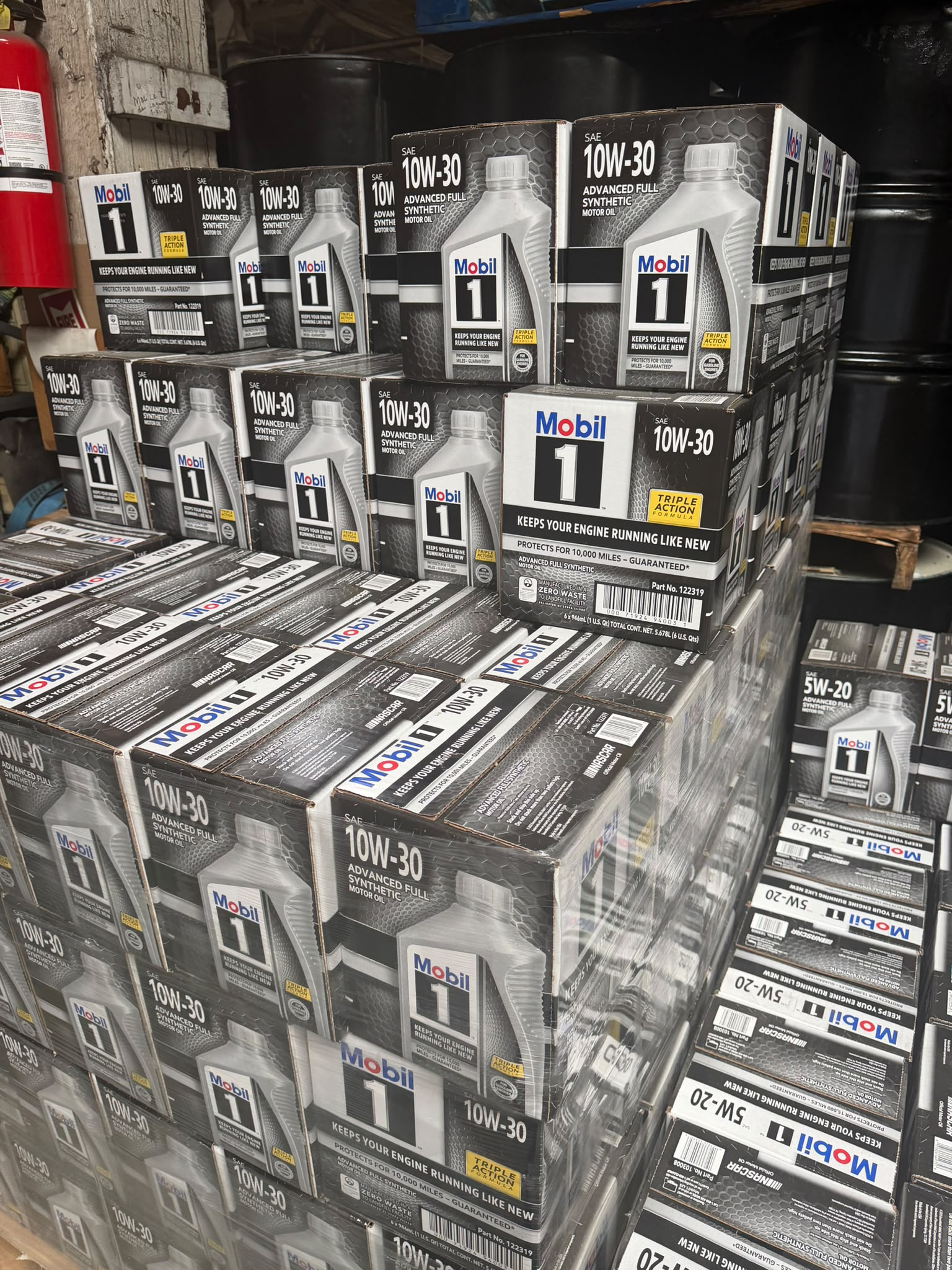 Pallet of Mobil 1 SAE 10W-30 advanced full synthetic motor oil cases at the Bass Oil warehouse in Brooklyn