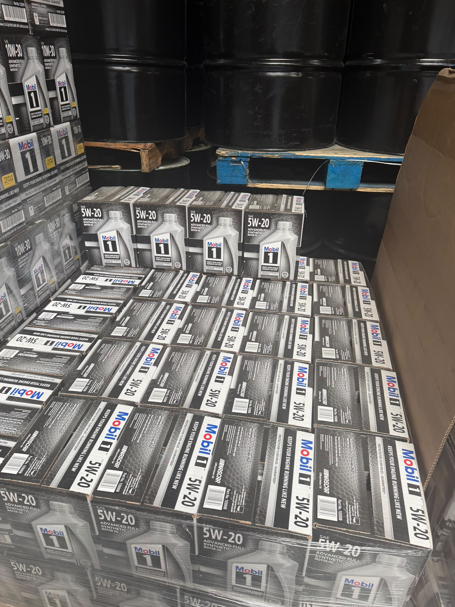 Pallet of Mobil 1 SAE 5W-20 advanced full synthetic motor oil cases at the Bass Oil warehouse in Brooklyn