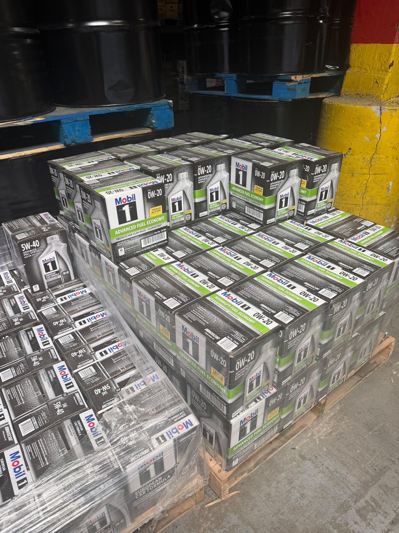 Pallet of Mobil 1 Advanced Fuel Economy SAE 0W-20 motor oil cases at the Bass Oil warehouse in Brooklyn