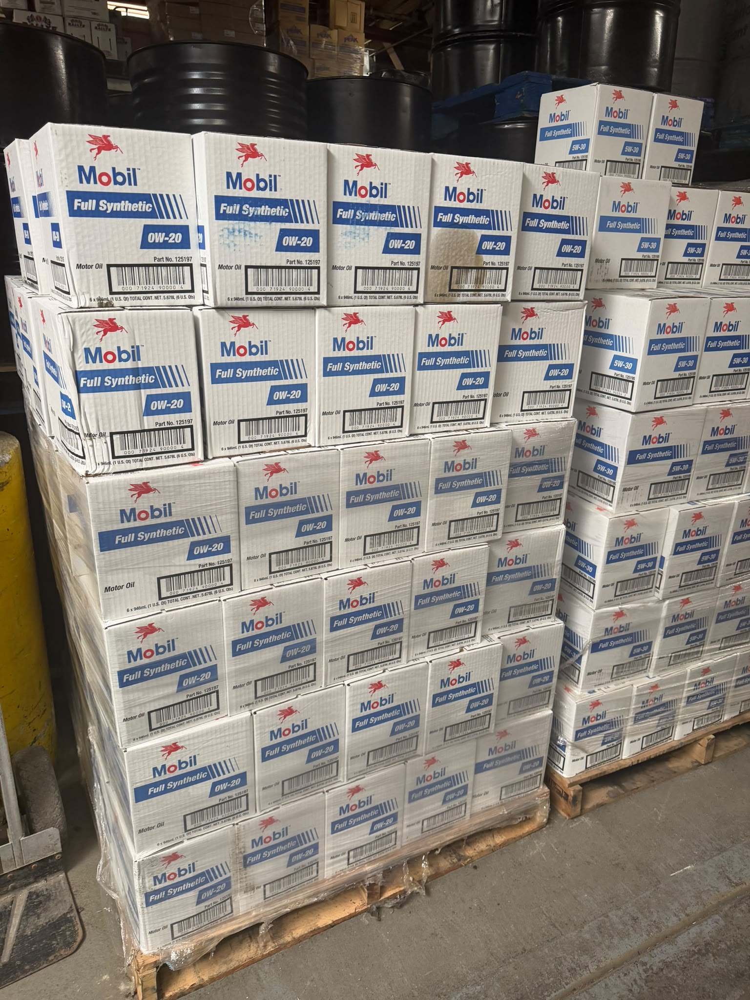 Pallet of Mobil Full Synthetic SAE 0W-20 motor oil cases at the Bass Oil warehouse in Brooklyn