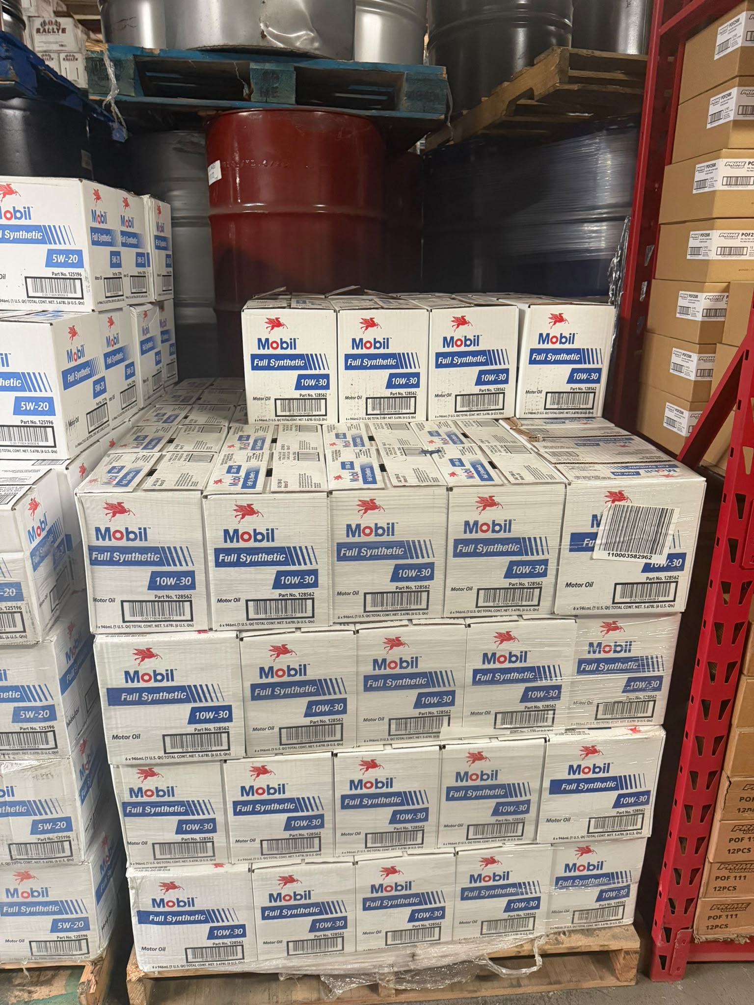 Pallet of Mobil Full Synthetic SAE 10W-30 motor oil cases at the Bass Oil warehouse in Brooklyn