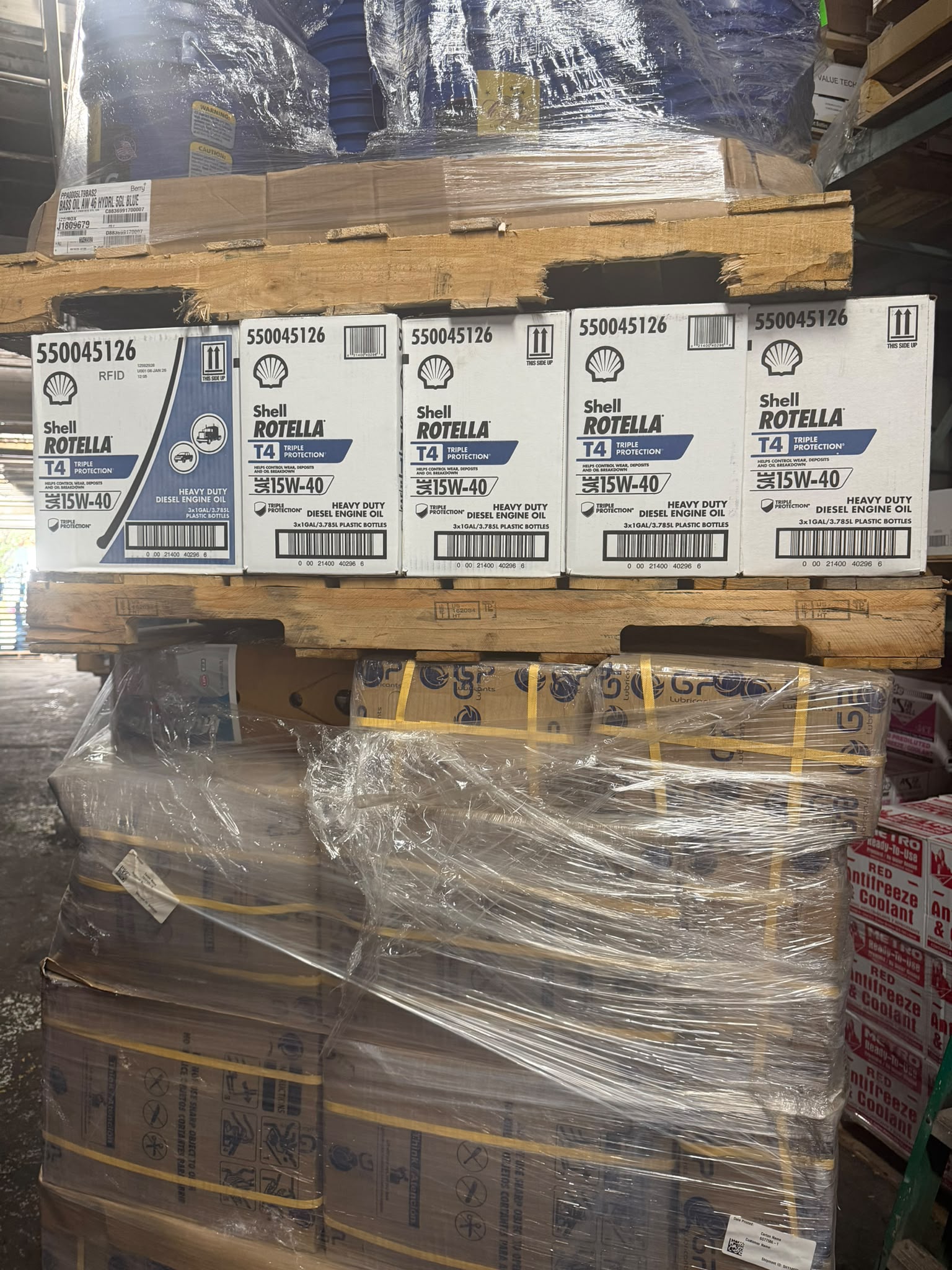 Cases of Shell Rotella T4 Triple Protection SAE 15W-40 Heavy Duty Diesel Engine Oil on a pallet at the Bass Oil warehouse in Brooklyn